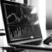 AI trading signals on a laptop screen.
