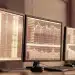 Algo trading monitors displaying financial charts.