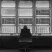 Automated trading system monitors market data on multiple screens.
