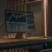EFX trading bot analyzing charts on a computer screen.