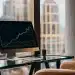 Tradeonic investment platform analysis on a computer screen.