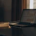 Financial charts on a laptop for investment analysis.