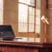 Stock market data on laptop for busy professionals.