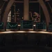 AI crypto trading bot analyzing market data on multiple monitors.