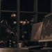 AI automated trading software setup with keyboard and charts.