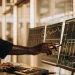 AI stock trading analysis on computer screens.